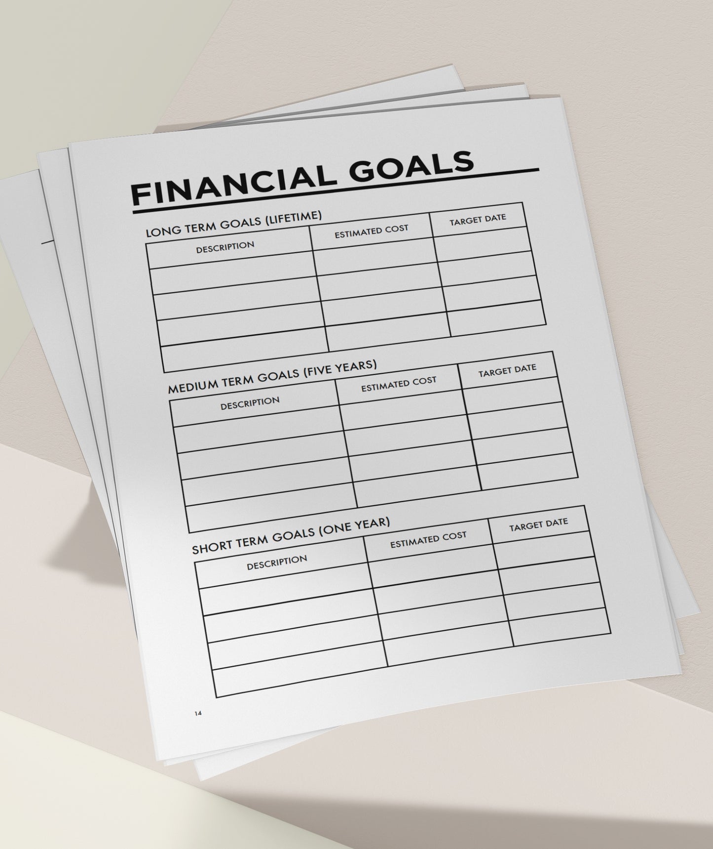 MSTRPLN printable planner showing the financial goals page on top of a neutral table. 