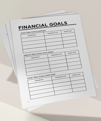 MSTRPLN printable planner showing the financial goals page on top of a neutral table. 
